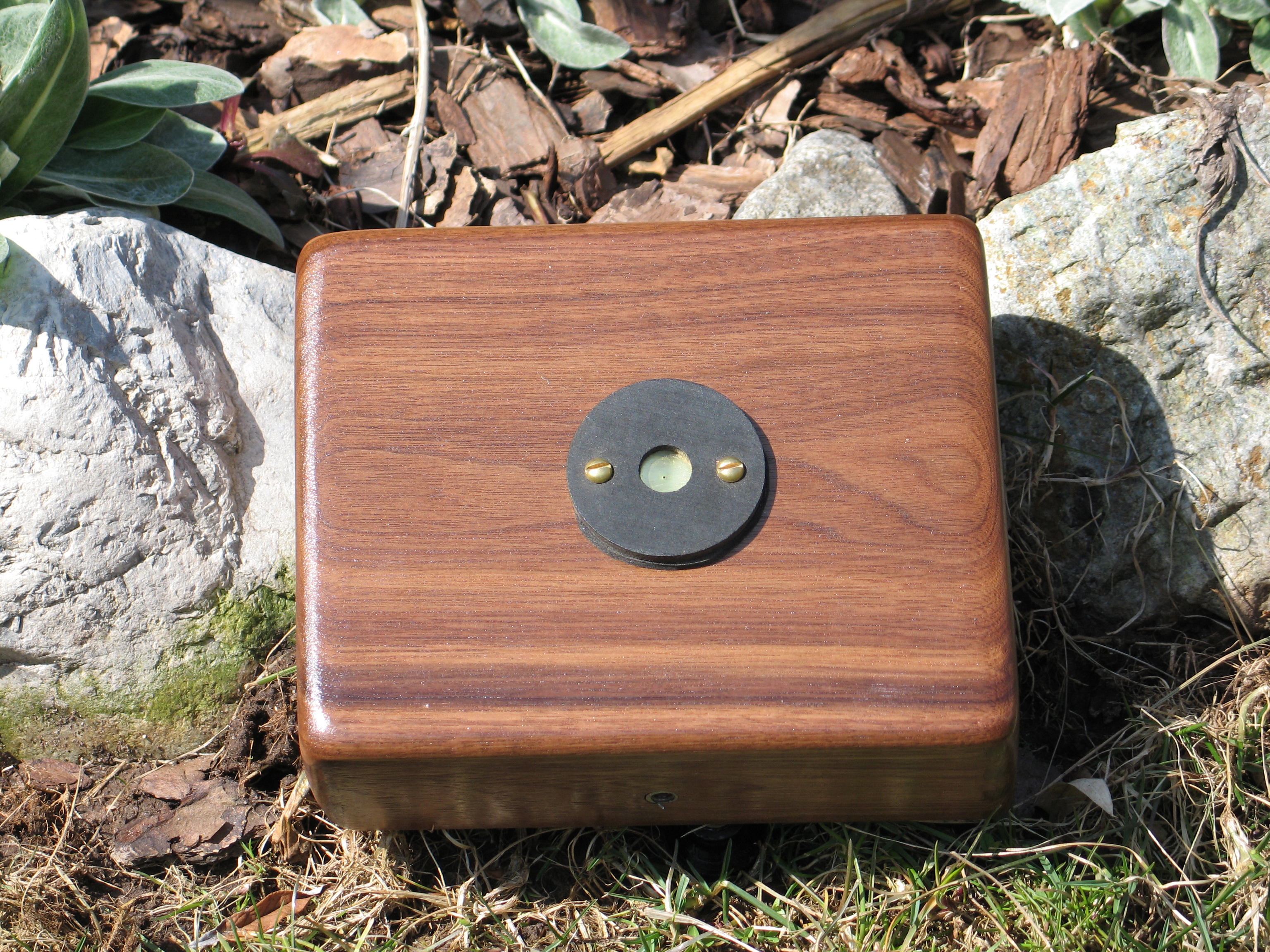 Handmade wooden pinhole camera with brass pinhole mount